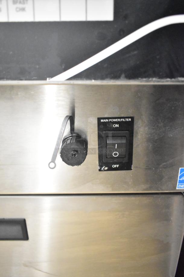 Henny Penny EEG-253 fryer control panel with main power/filter switch.