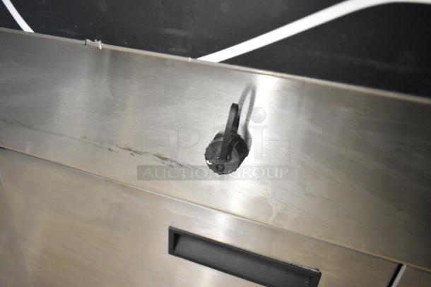 Henny Penny EEG-253 commercial propane 3-bay fryer, 225,000 BTU, stainless steel with control knob, on commercial casters.