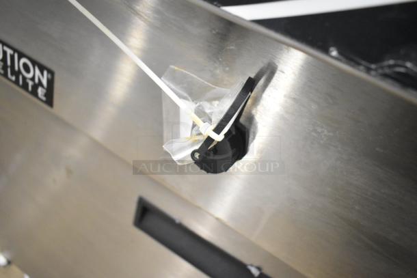 Henny Penny EEG-253 commercial propane fryer, 3 bay, 225,000 BTU, on casters. Stainless steel body with security tag attached.