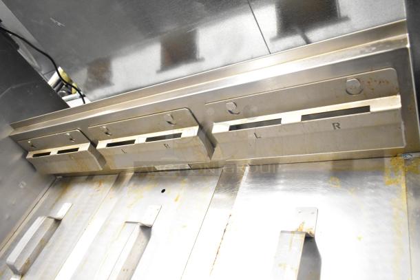 Henny Penny EEG-253 3 Bay Propane Gas Fryer on casters, 225,000 BTU, showing interior bay and control slots.