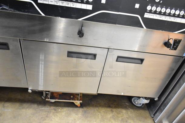 Henny Penny EEG-253 commercial propane gas 3 bay fryer, 225,000 BTU, on casters, stainless steel, used condition.