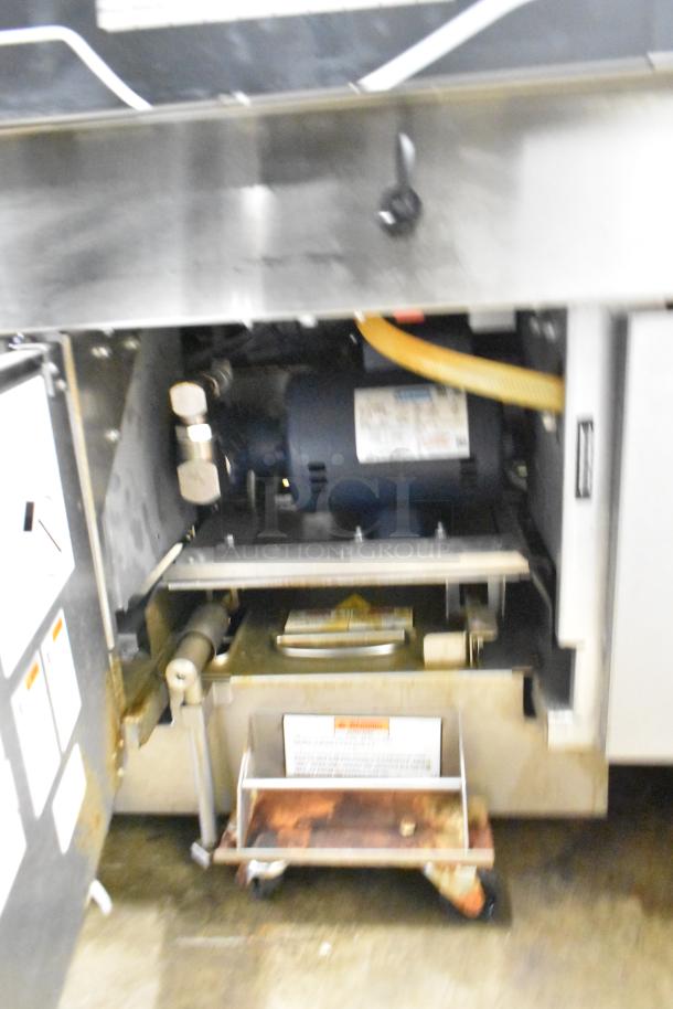 Henny Penny EEG-253 3 Bay Fryer, propane gas powered, 225,000 BTU, on commercial casters, stainless steel, visible labels.