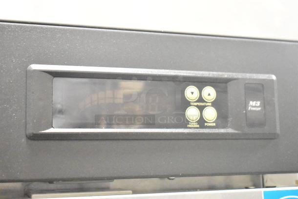 Turbo Air M3F24-1-N single door freezer panel with temperature controls, Turbo Freezing, and power buttons visible.