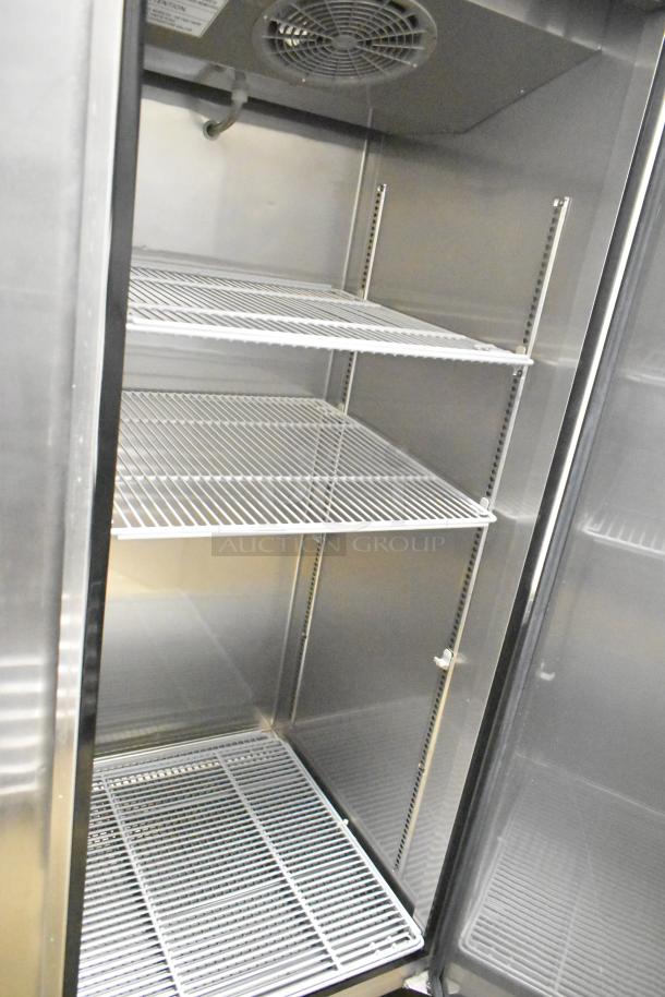 Turbo Air M3F24-1-N commercial freezer, single door, 115 volts, 1 phase, features metal shelves, excellent condition.