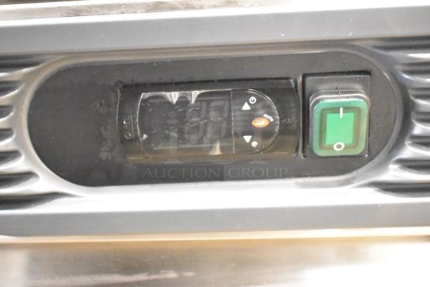 2021 Migali C-2RB-35-HC Commercial 2 Door Reach-In Cooler control panel, digital display, and power switch.