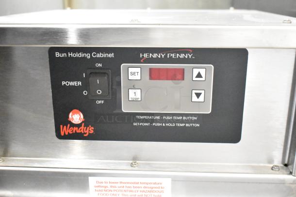 Henny Penny BW-100 Heated Holding Cabinet, 120V, 1 Phase. Features digital controls, power switch, Wendy’s branding.