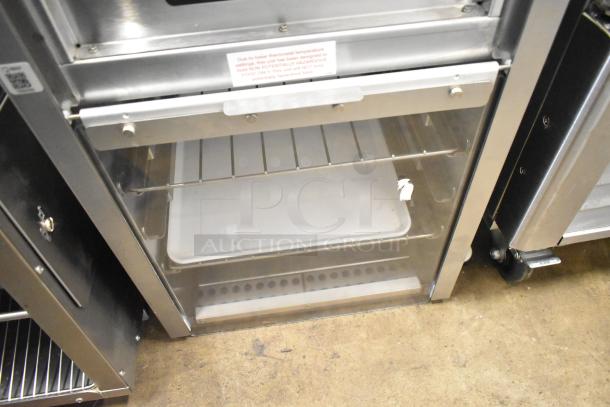 Henny Penny BW-100 countertop heated holding cabinet merchandiser, 120V, 1 phase, stainless steel, clear door, interior rack.