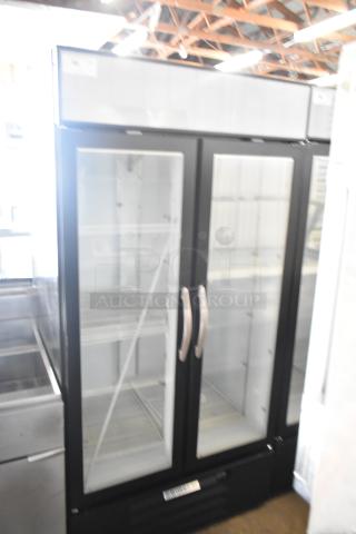 Beverage Air MMF35HC-1-B commercial 2-door reach-in freezer, black frame, glass doors, shelves visible, 115 volts, 1 phase.