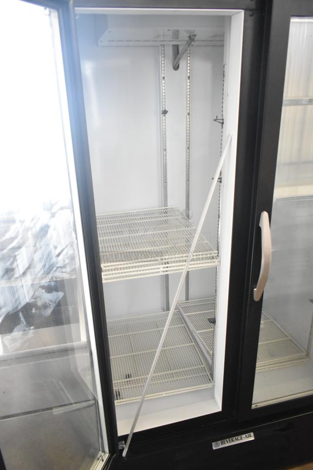 Beverage Air MMF35HC-1-B 2-door freezer merchandiser, commercial grade, shelves visible, 115V, excellent condition.