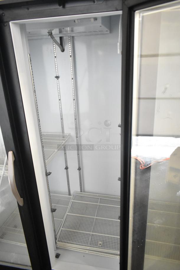 Beverage Air MMF35HC-1-B commercial freezer, 2 glass doors, interior shelves, 115 volts, 1 phase, clean condition.