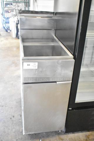 Commercial floor-style gas-powered deep fat fryer in stainless steel, with visible label indicating auction lot number 60. Appears in good condition.