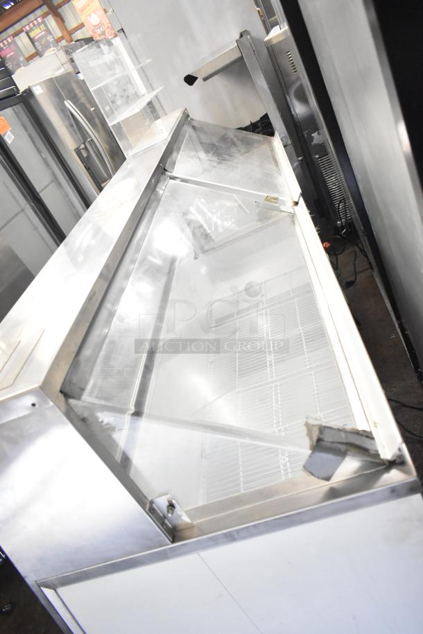 Master-Bilt commercial ice cream dipping cabinet, 115 volts, 1 phase. Stainless steel exterior, glass display, in good condition.