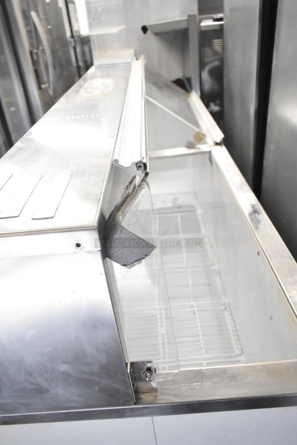 Master-Bilt commercial ice cream dipping cabinet, 115 volts, 1 phase, stainless steel, visible wear, taped cover repair.