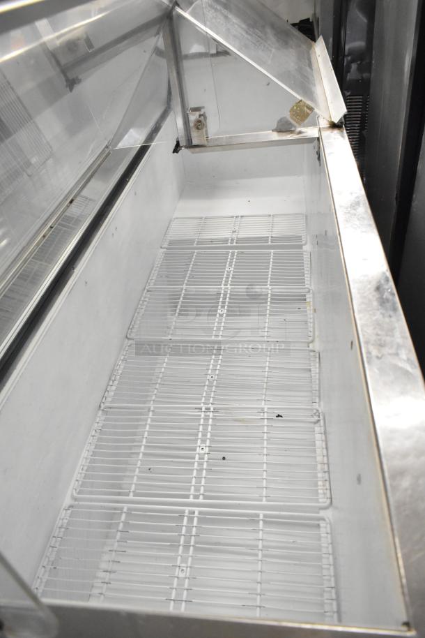 Master-Bilt commercial ice cream dipping cabinet, 115 volts, 1 phase, stainless steel interior, clean condition.