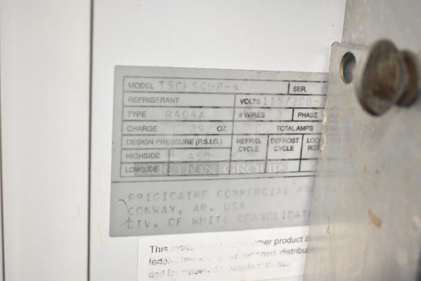 Kelvinator T5CHSGHP-4 label showing refrigerant R404A, voltage 115/208-230V, and model details for commercial refrigerator.