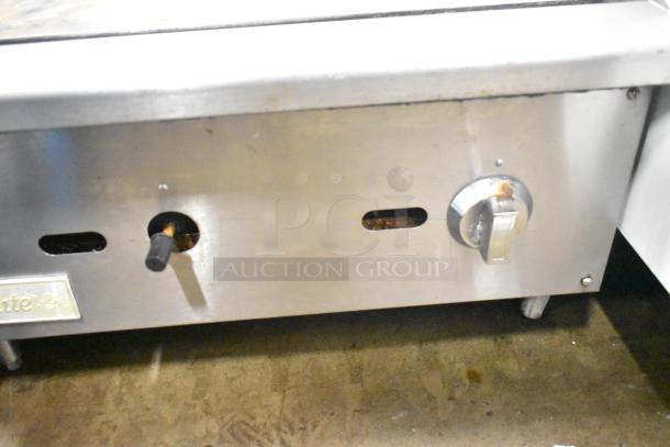 Qualite Commercial Gas Griddle, stainless steel, countertop model, used condition, single control knob, Qualite label.