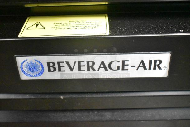 Beverage Air MT53-1-SD cooler label, showing brand logo. Metal plate indicates commercial use, 115 volts, 1 phase.