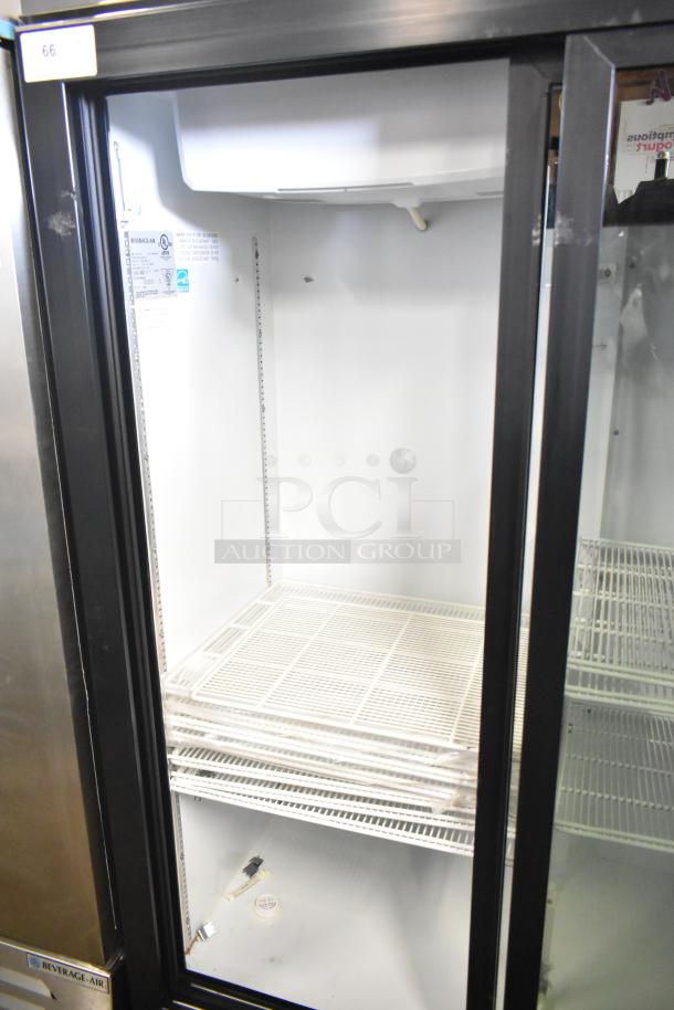 Beverage Air MT53-1-SD commercial 2-door cooler merchandiser, 115V, 1 phase, clean interior, shelving intact, model label visible.