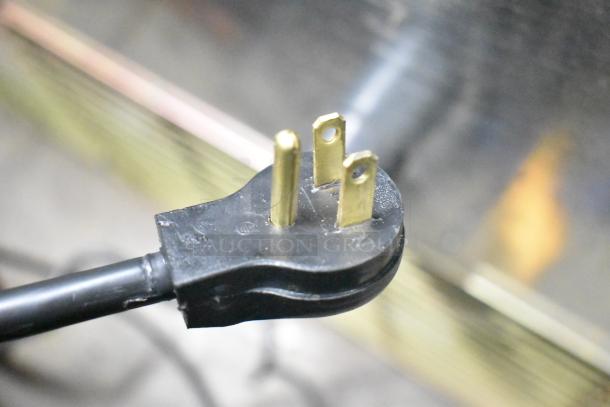 Close-up of the power plug for Beverage Air MT53-1-SD cooler, 115 volts, 1 phase.