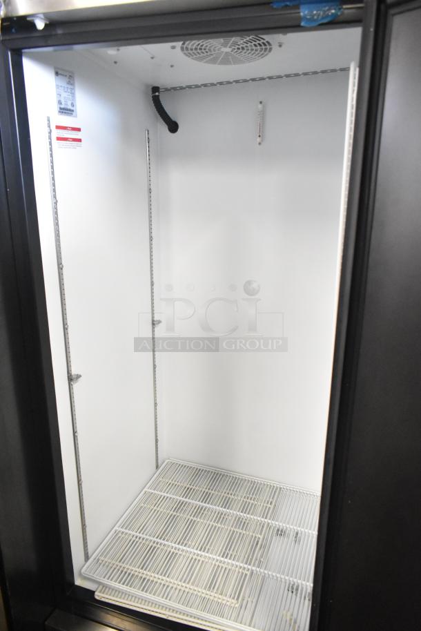 Beverage Air SR1HC-1S commercial single door cooler, 115 volts, pristine condition, adjustable shelving, interior fan visible.