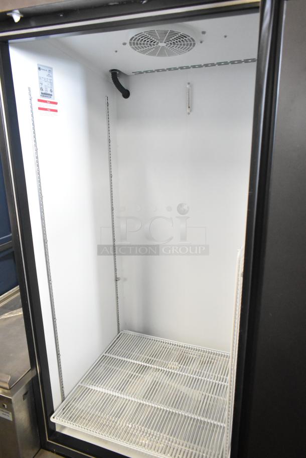 Beverage Air SF1HC-1S commercial reach-in freezer, single door, white interior, adjustable shelves, 115V, nearly new condition.