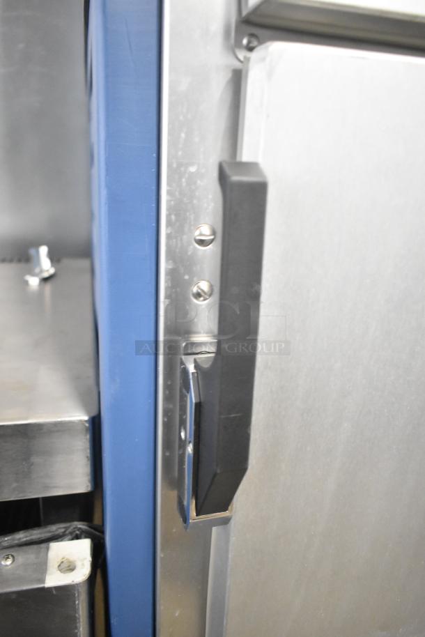 2020 Metro C5 3 Series heated cabinet handle and door detail, stainless steel finished, on commercial casters. 208V, 1 phase.