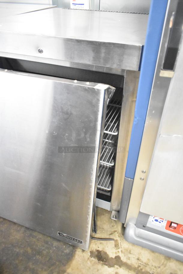 2021 Hoshizaki HR24C commercial undercounter cooler, stainless steel, single door open, shelves visible, model label shown.