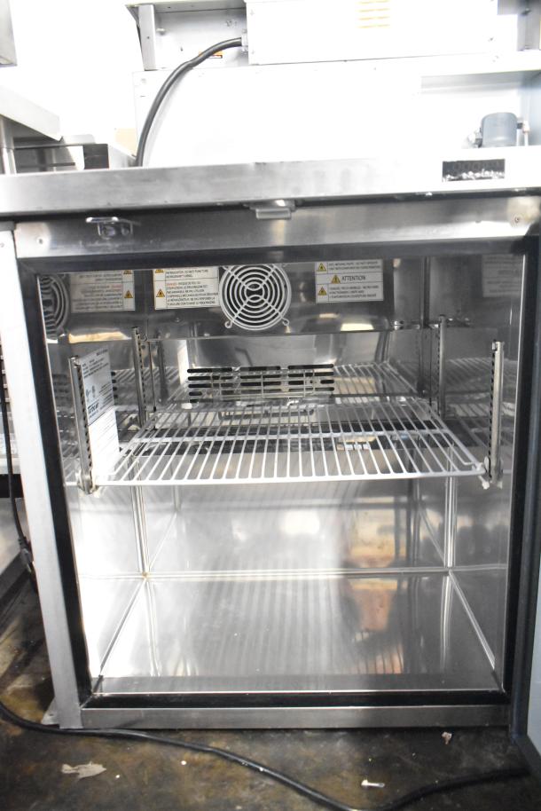 Turbo Air MUF-28-N Commercial Single Door Undercounter Freezer, stainless steel, visible warning labels, 115 Volts, 1 Phase.