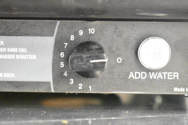 Vollrath Cayenne 1001 countertop food warmer, temperature dial labeled 1-10, add water indicator, 120 volts, 1 phase.