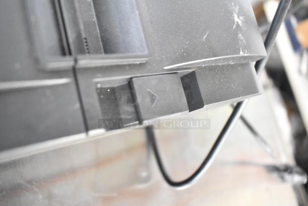 Star TSP100II Receipt Printer, black, dusty condition, cable connected, power button visible.