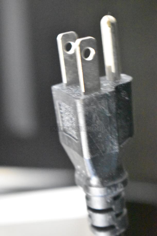 Close-up of a power plug, likely from a 2024 Avantco 178UDD1HC commercial kegerator.