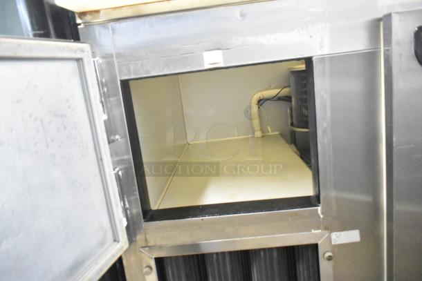 Leader LM36 S/C Commercial 2 Door Undercounter Cooler, 115V, 1 Phase. Interior view, clean condition, stainless steel.
