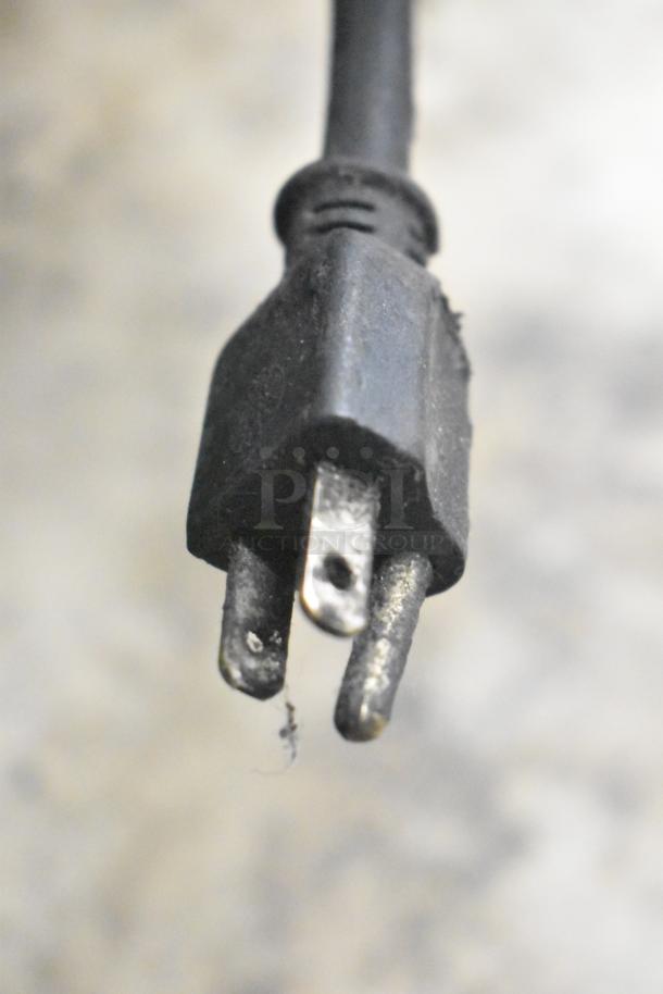Close-up of a power plug for a Leader LM36 S/C Commercial 2 Door Undercounter Cooler, 115 Volts, 1 Phase.
