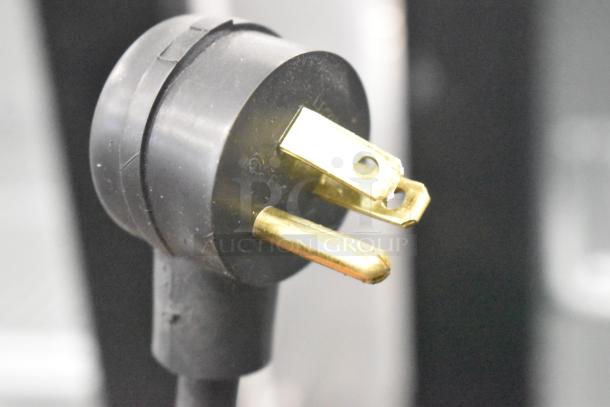 Close-up of a power plug for Habco SE12 Commercial Single Door Reach-In Cooler, 115 volts, 1 phase.