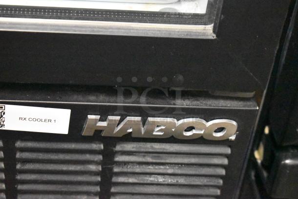 Habco SE12 commercial cooler merchandiser, single door, visible logo and "RX Cooler 1" label, 115 volts, 1 phase.