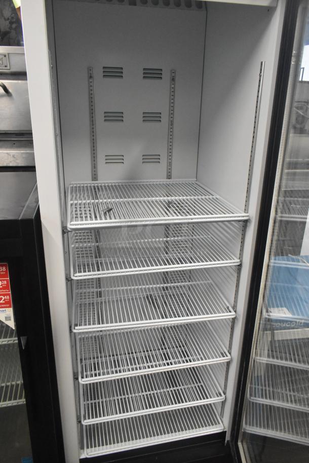 2019 Habco SE18 commercial single door reach-in cooler, 115 volts, 1 phase, with white wire shelves, lightly used.