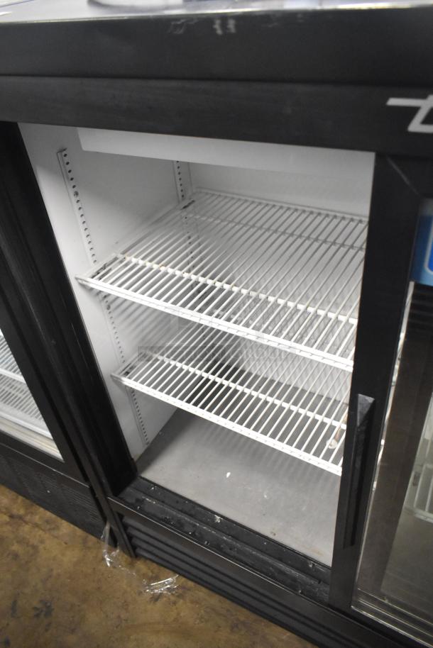 2018 True GDM-41SL-48-HC-LD commercial 2-door cooler, glass doors, white interior shelves, used condition.