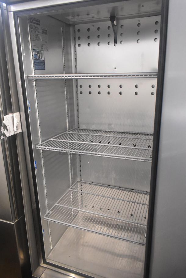 2022 True T-19F-HC commercial single door reach-in freezer, with casters, 115V, 1 phase, adjustable shelves, excellent condition.