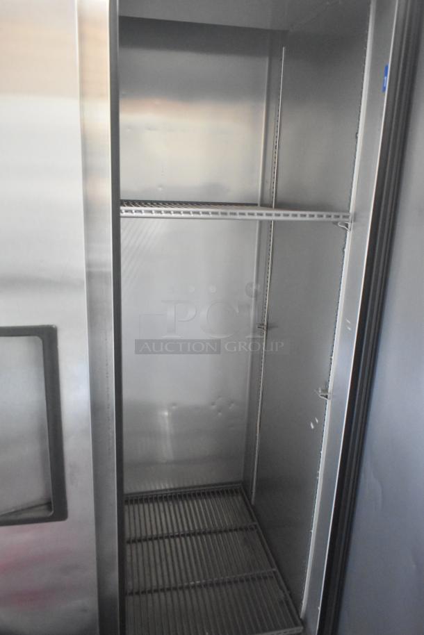 2022 True T-35-HC Commercial Reach-In Cooler, 2 stainless steel doors, wire shelving, on casters, 115V, 1 phase.