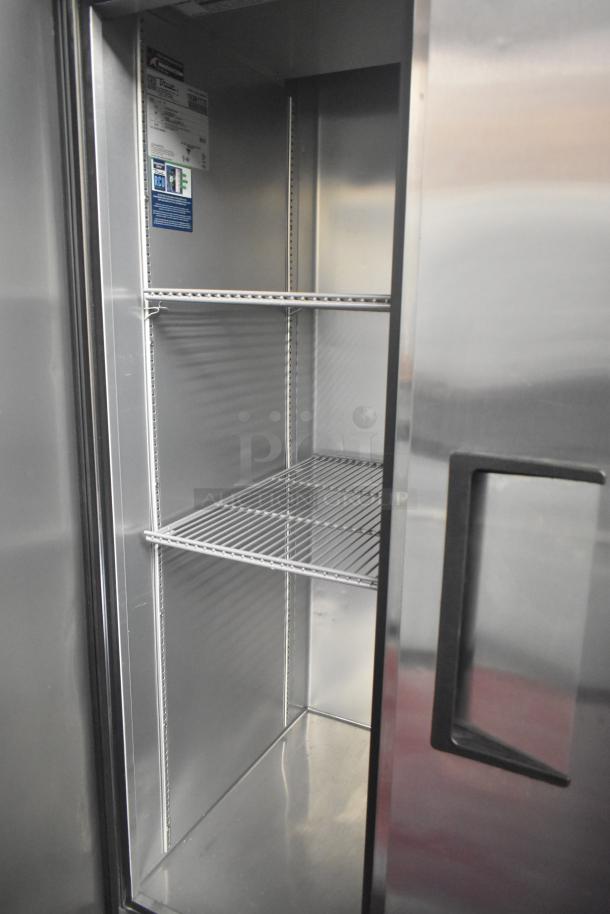 2022 True T-35-HC commercial cooler, 2 doors, stainless steel, shelves, on casters, 115V, 1 Phase. Internal label shown.