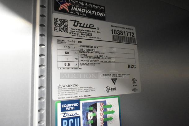 Label for True T-35-HC Commercial Cooler showing model, voltage, refrigerant type R290, and design pressures.