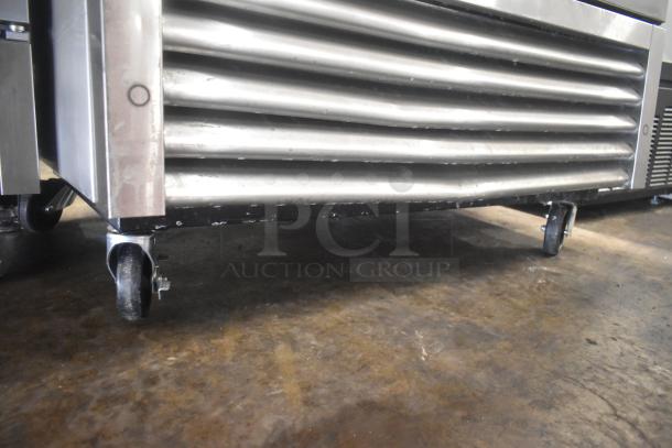 True T-35-HC 2022 commercial 2-door reach-in cooler on casters. Features stainless steel finish, 115V, 1-phase.
