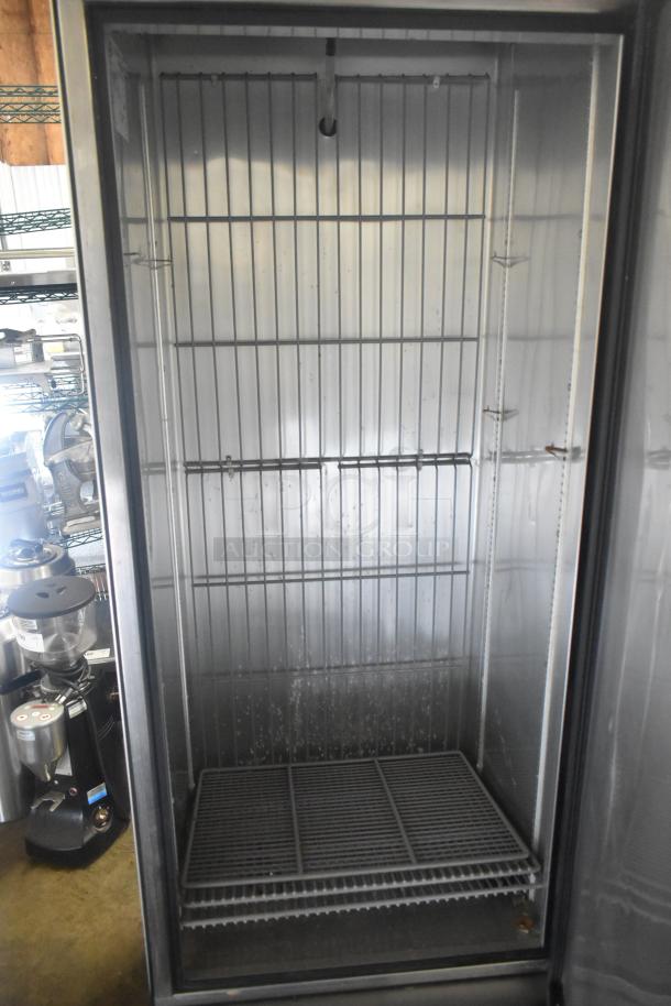 2022 True T-19F commercial freezer, single door, on casters. Features wire shelves, stainless interior, 115V, excellent condition.