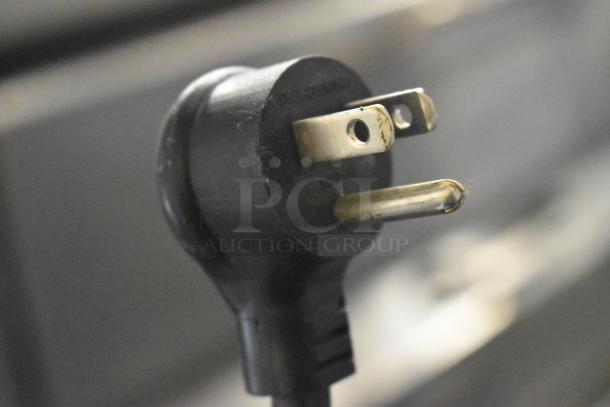 Close-up of a power plug for the 2022 True T-19F Commercial Reach In Freezer, 115 Volts, 1 Phase.