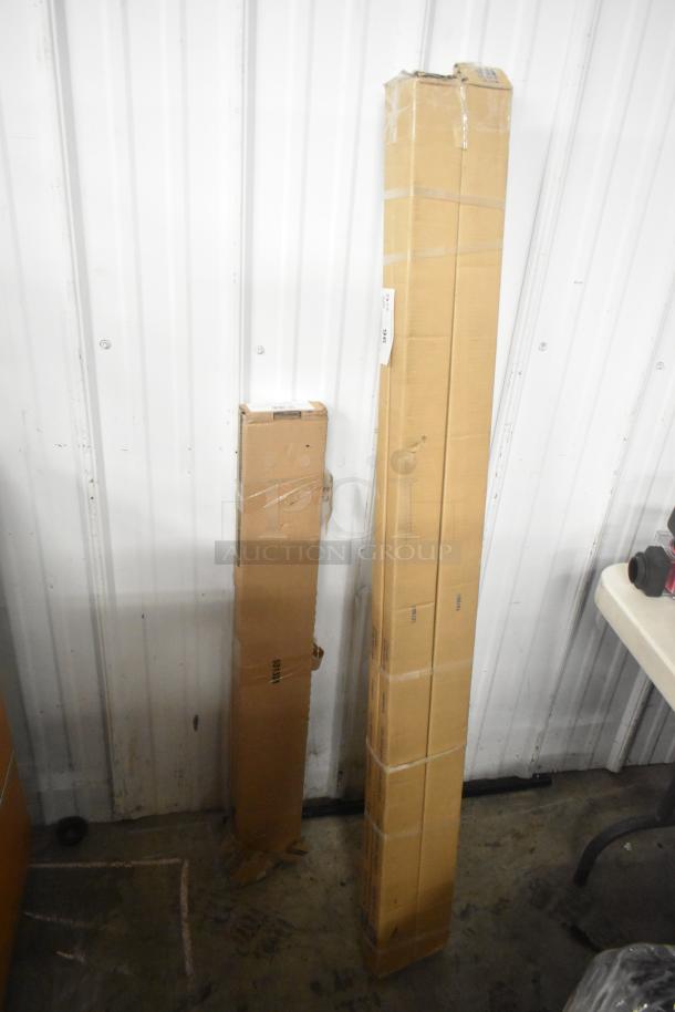 Five boxed items including XCL-111-02-036-AL 36" door sweep. Boxes are sealed and in good condition, ready for shipment.