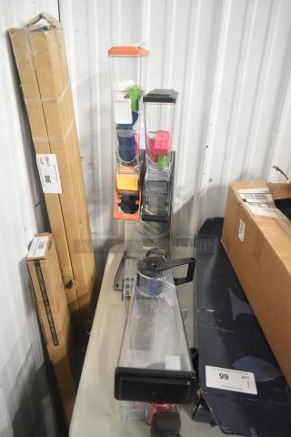 Server countertop dry dispenser, multiple colorful compartments, good condition, clear acrylic, suitable for grains or candies.