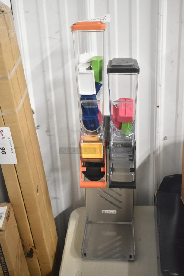 Server Countertop Dry Dispenser with dual chambers, multicolor handles, clear containers, and base, in excellent condition.