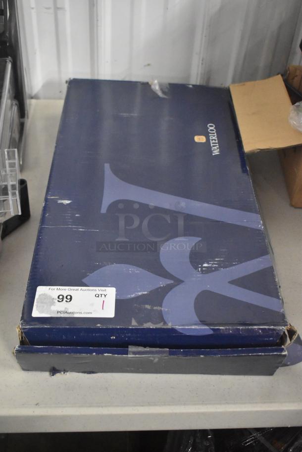 Box of Waterloo 750PRD4X Pre-Rinse Faucet, 1.15 GPM, deck-mounted, 4" centers, scratch and dent condition, brand new.