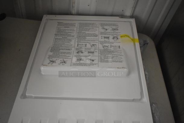 Brand new Hoshizaki self-contained ice machine door with instructions. Minor scratches visible.