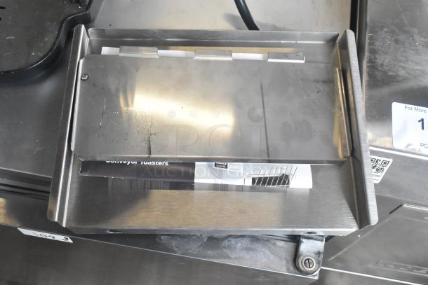 Brand new Avantco 184T140 conveyor toaster, 10" wide, 3" opening, 300 slices/hour, 120V, 1 phase. Scratch and dent condition.